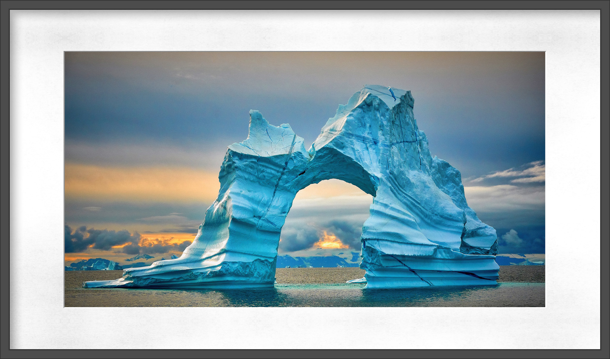 Beautifully sculptured iceberg at dawn